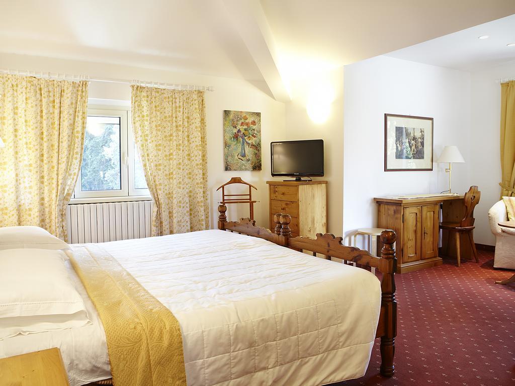 Albergo Milano Snc Ланцо-д’Интельви Номер фото